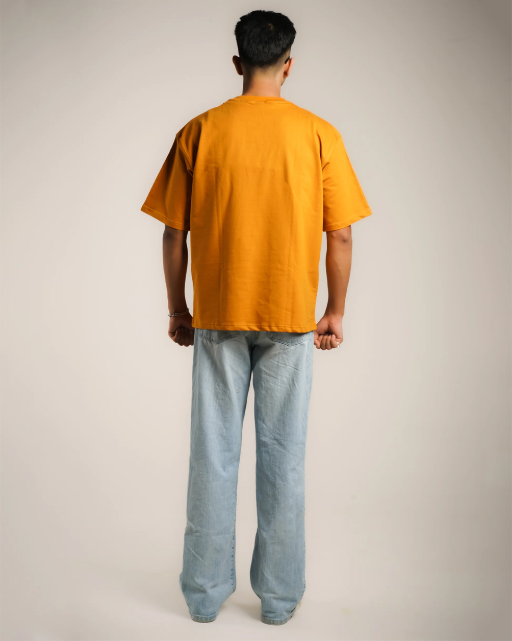 AVVARA Oversized Tee - Amber Orange (Back View)